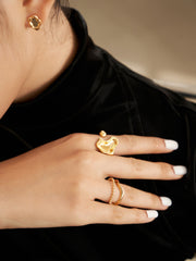 Elegant Model Showcasing Fluid Design Ring - Vintage Gold