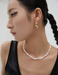 Model Wearing Baroque Pearl Necklace - Elegance in Pearls