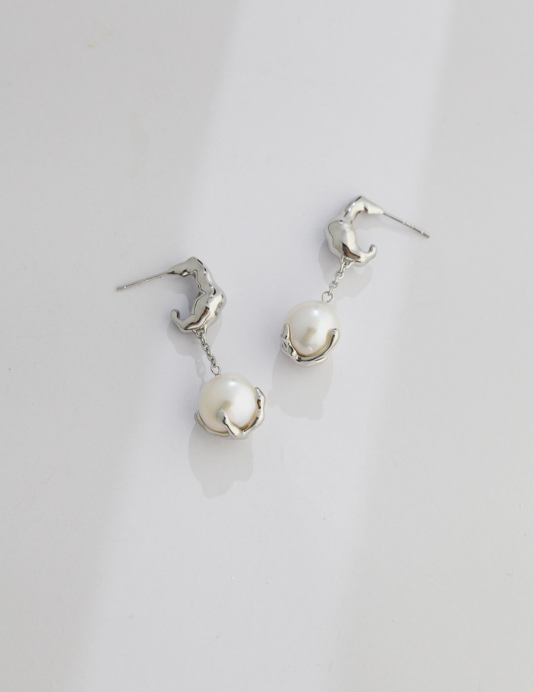 Elegant Silver Earrings - Detailed View