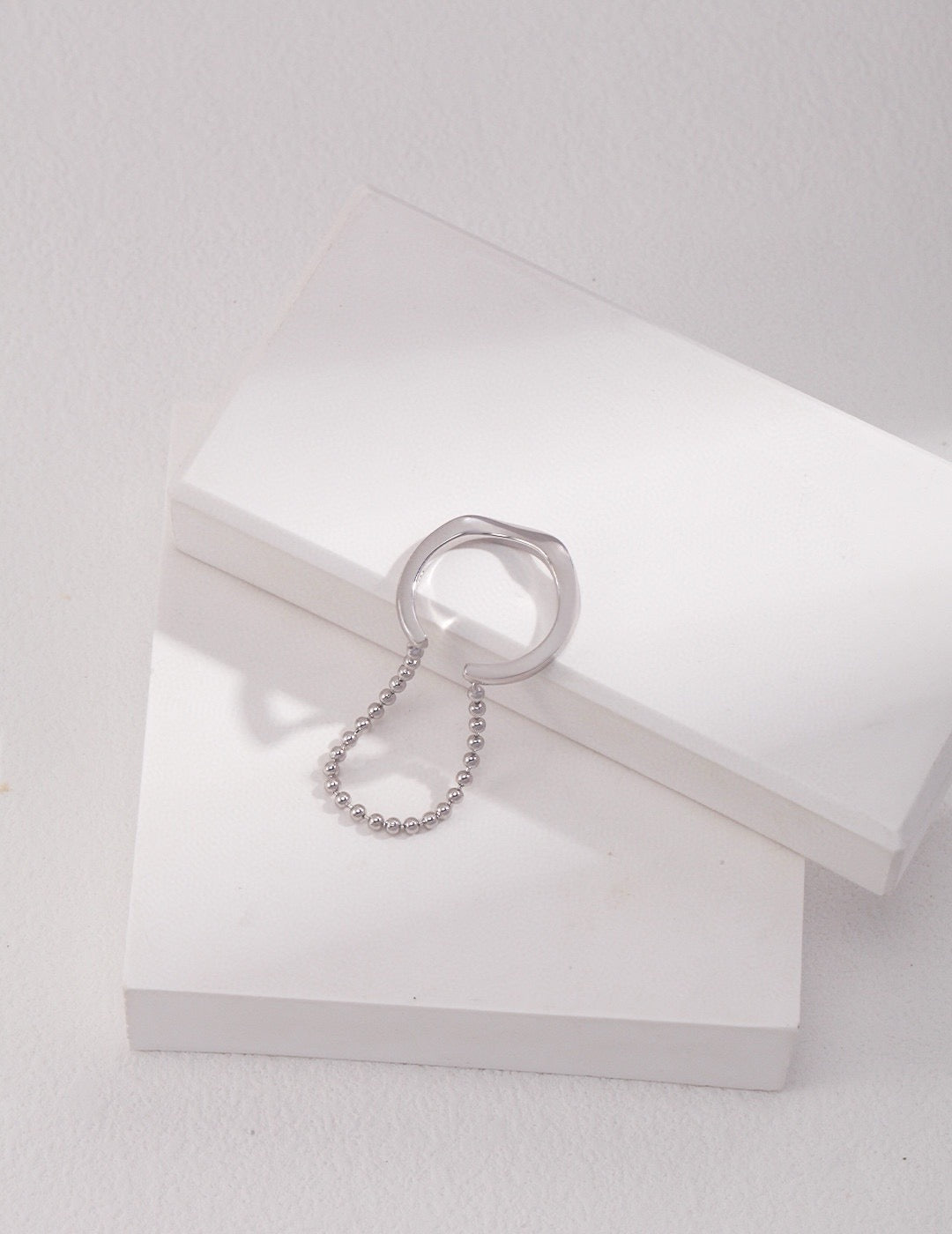 Sterling Silver Fluid Ring with Chain Detail