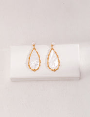 Vintage earrings with teardrop shaped natural pearls