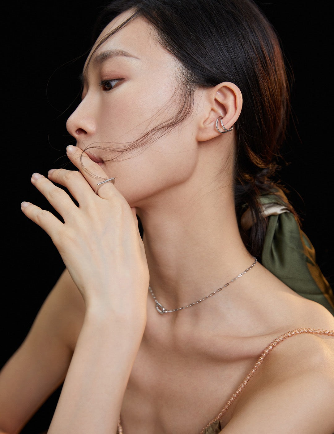 Model's hand elegantly showcasing Victoria Sterling Silver Ring in K Gold