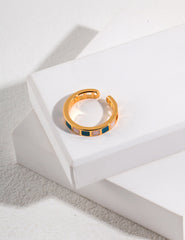 360-degree view of Morandi Square Drop Glaze Ring in antique gold color