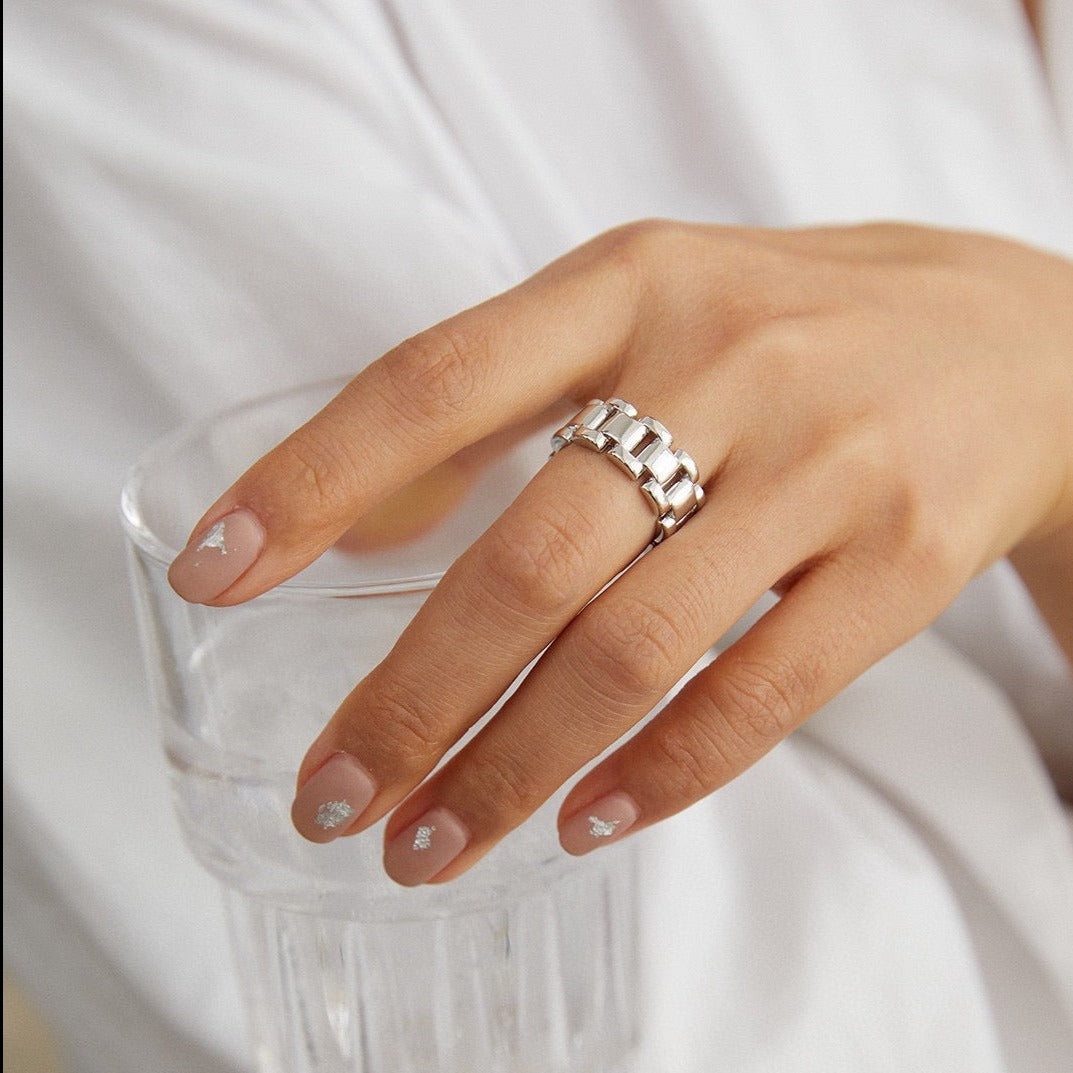 Model's hand gracefully displaying the Vivienne Sterling Silver Bracelet Ring