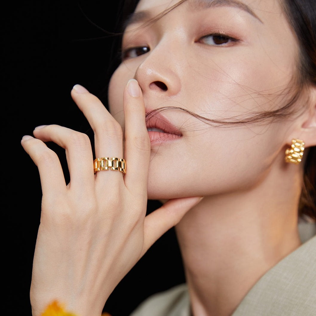 Model wearing Vivienne Sterling Silver Bracelet Ring in K-Gold