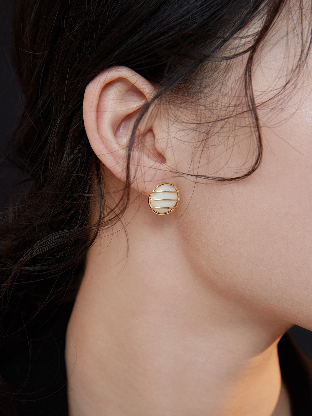 Side view of model showcasing the Charlotte Pure Silver Mother-of-Pearl Earrings